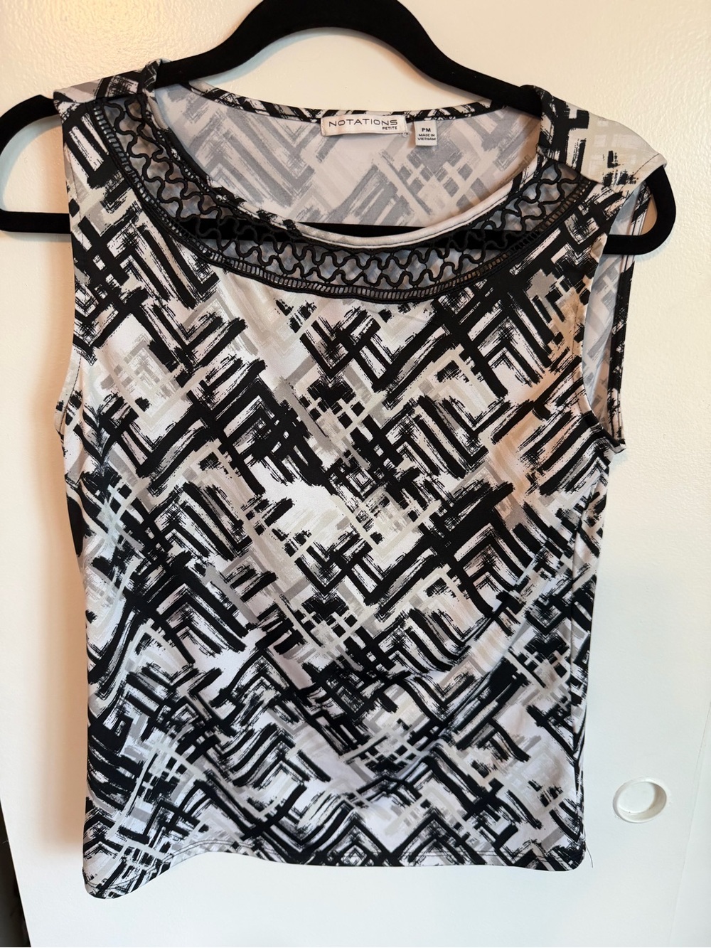 Notations Black & White Geometric Sleeveless Shell with Decorative Neckline
